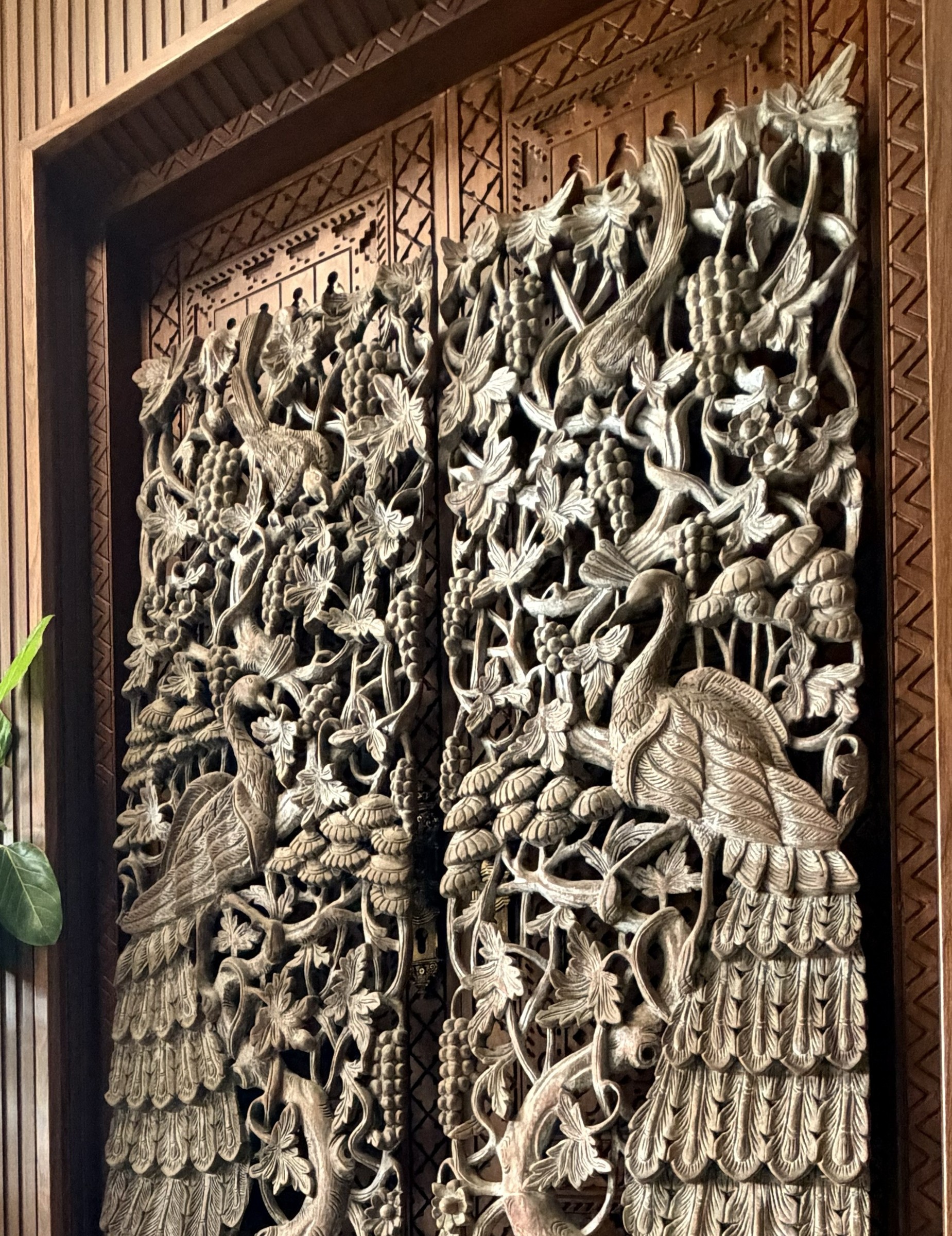 Pair of Carved Teak Wall Panels with Peacocks and Grapevines
