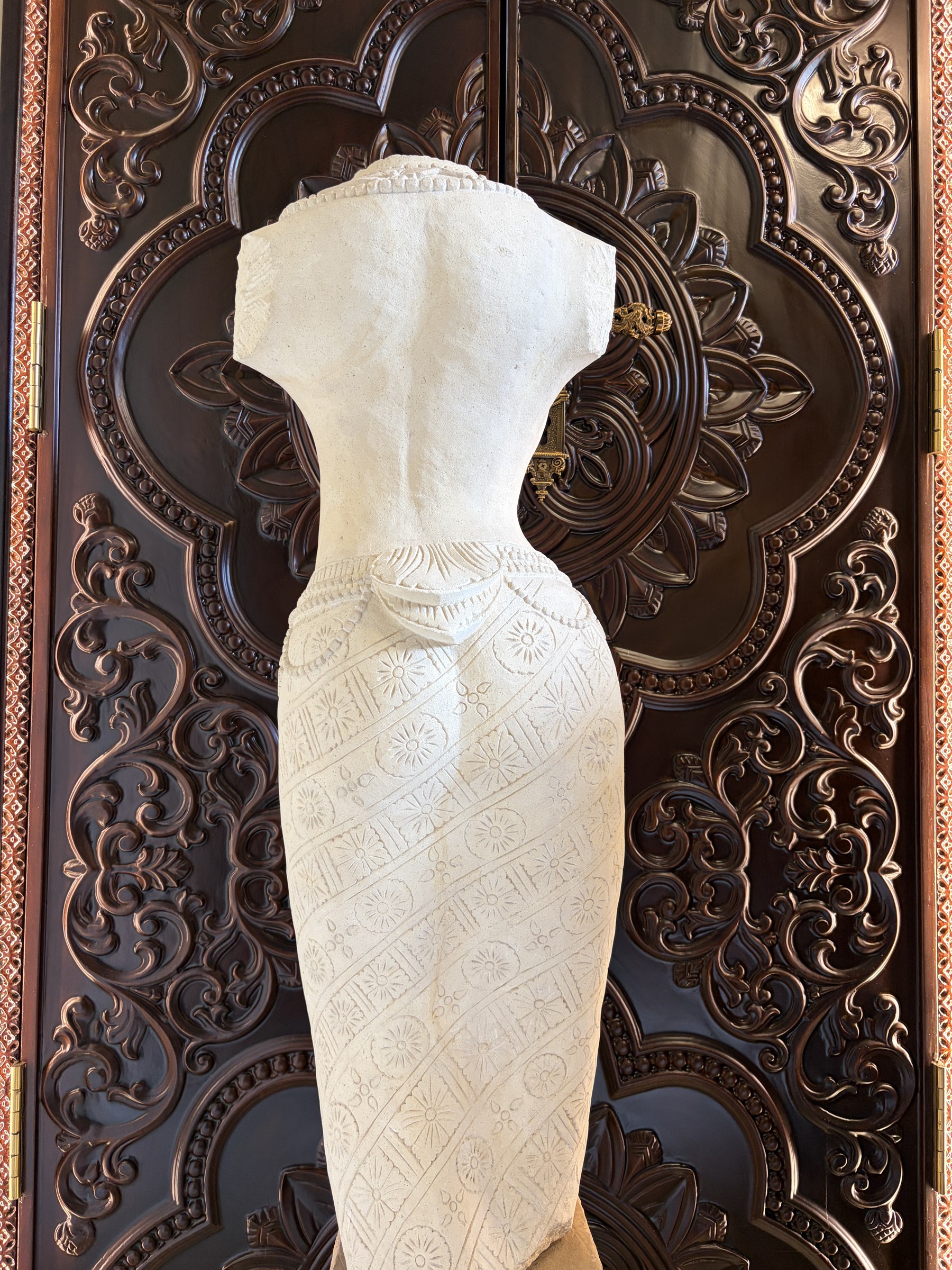 Carved Stone Torso of a Woman in a Sarong view 10