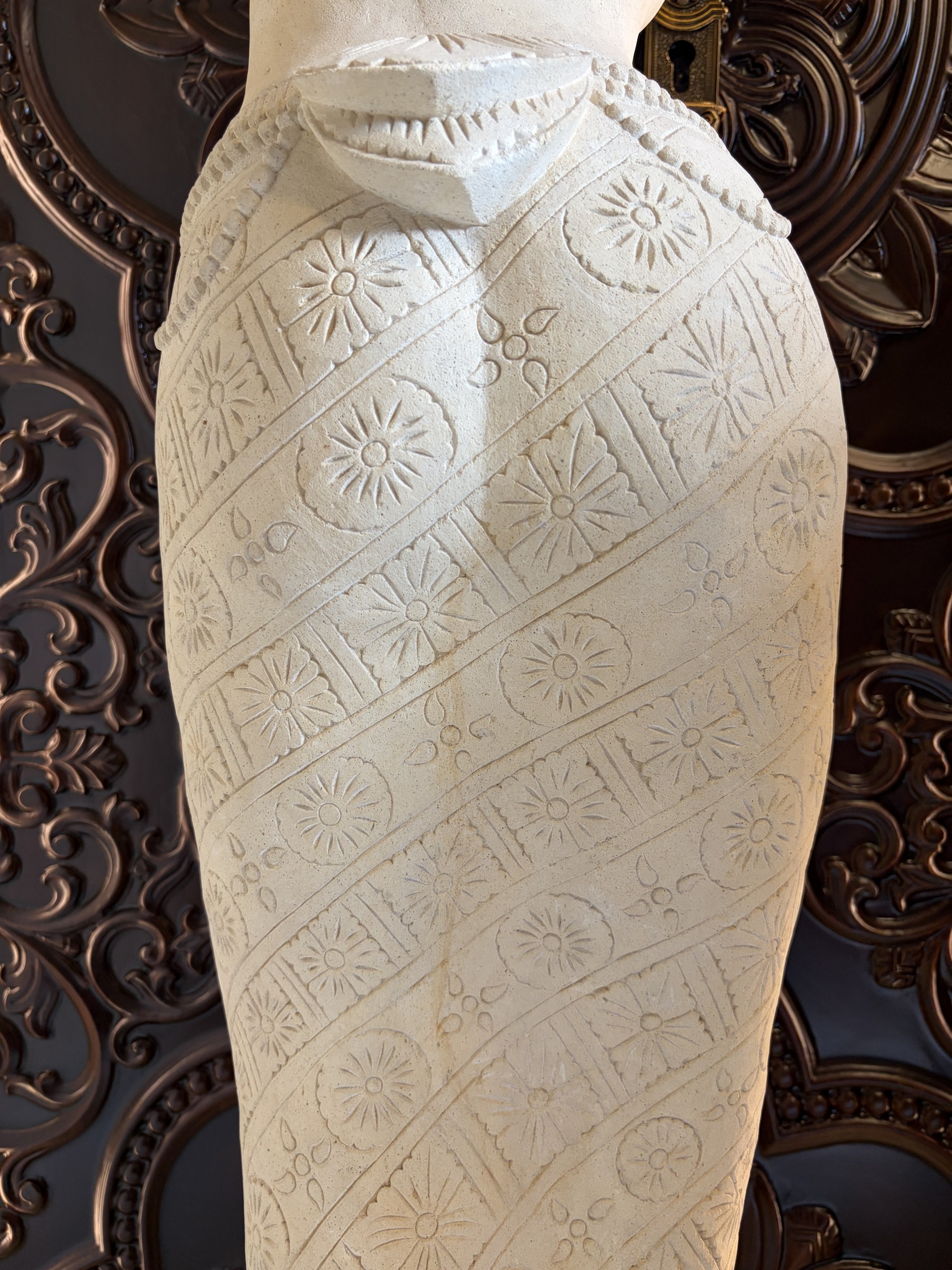 Carved Stone Torso of a Woman in a Sarong view 12