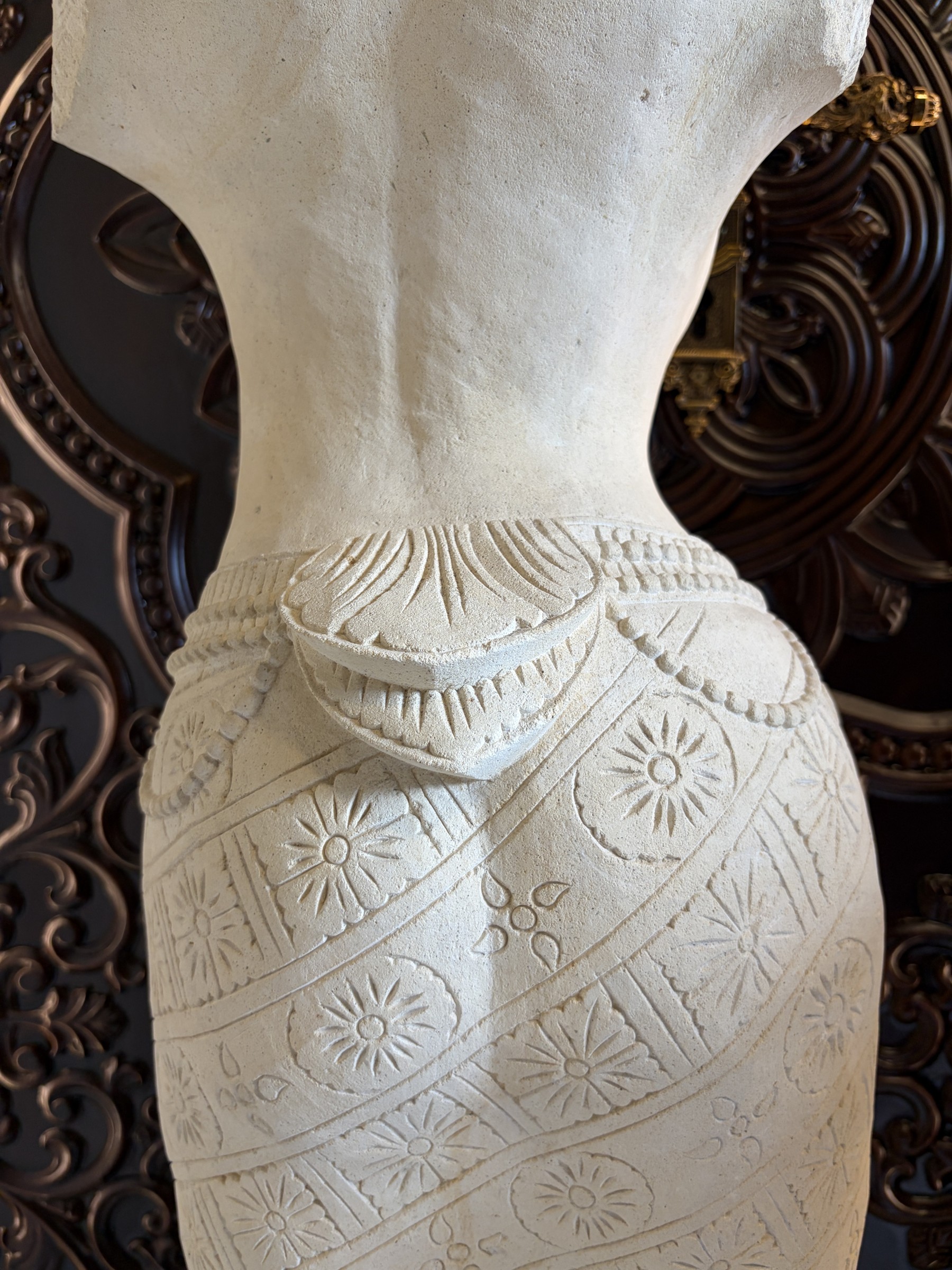 Carved Stone Torso of a Woman in a Sarong view 13