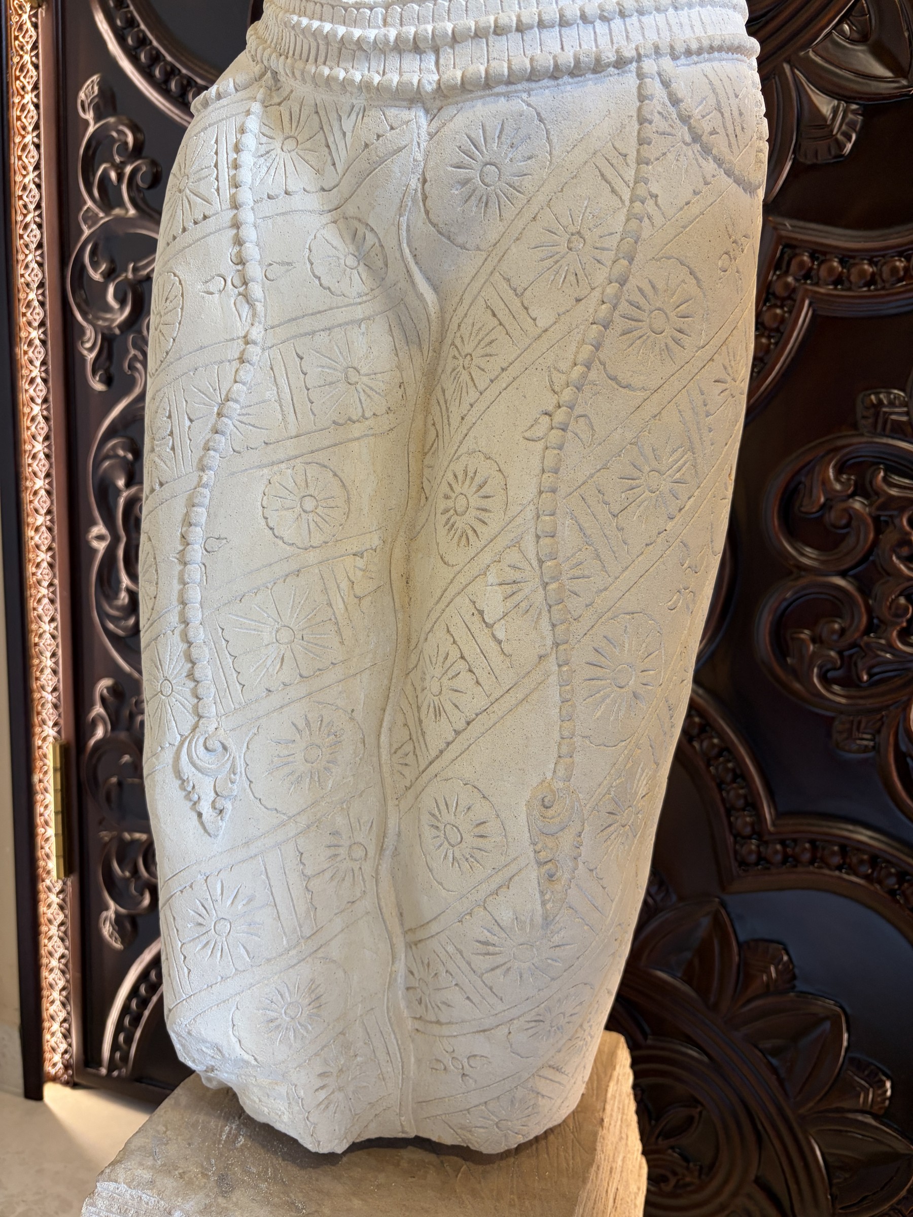 Carved Stone Torso of a Woman in a Sarong view 3