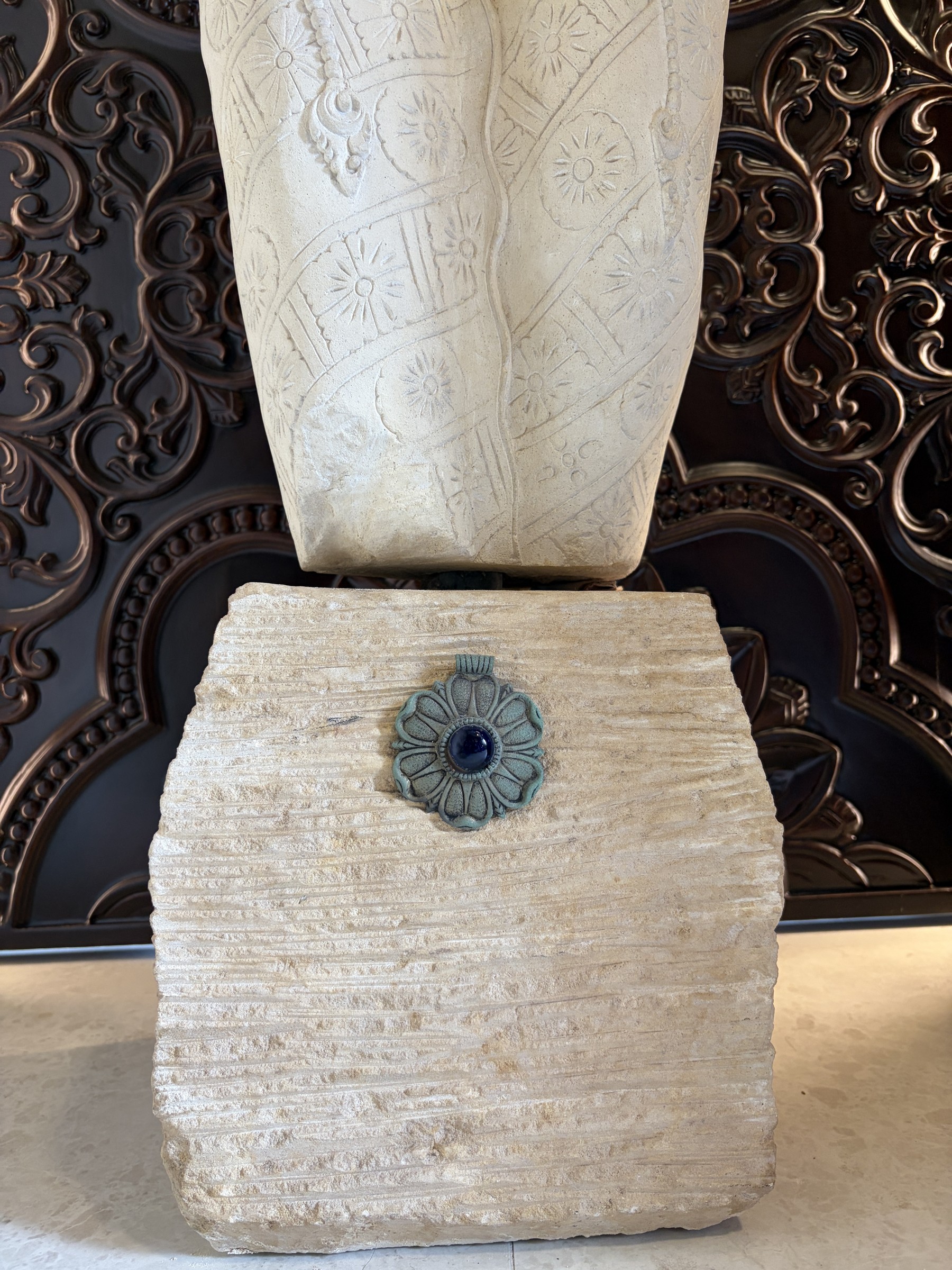 Carved Stone Torso of a Woman in a Sarong view 6