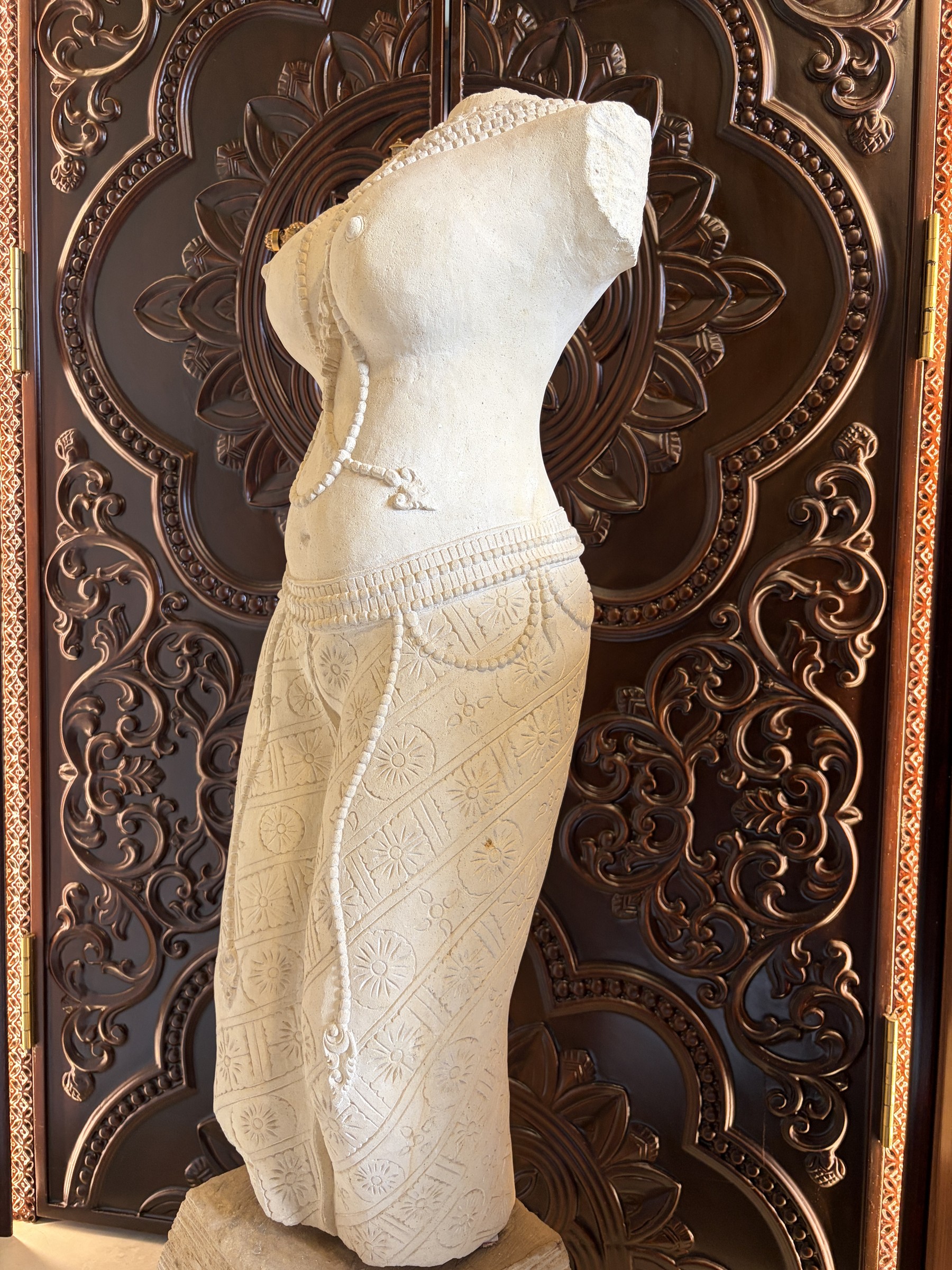 Carved Stone Torso of a Woman in a Sarong view 7
