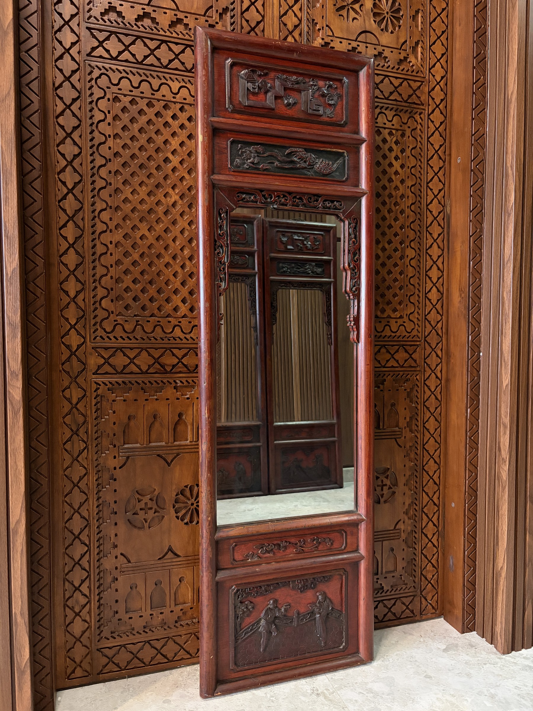 Carved Red Lacquer Mirror with Precious Objects and Figural Panels